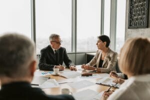 a peer advisory group sitting around a table